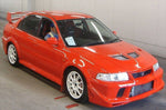 MITSUBISHI LANCER TOMMI MAKINEN CP9A FACE KIT FR BUMPER COLORLESS MR566814 tme